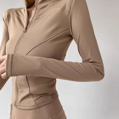 Capilorix women's quick-drying sports coat with long sleeves, zipper, tight fit, ideal for running and yoga, available in sizes S-3XL.