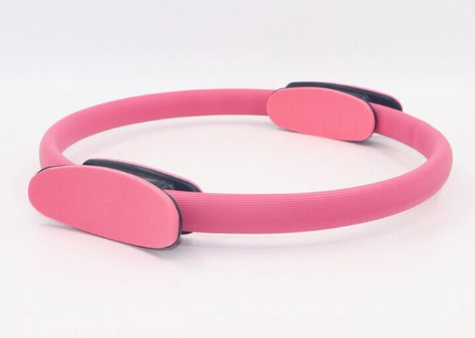Capilorix yoga fitness Pilates ring and activewear jumpsuit for women and girls, used for home gym workouts and body resistance training.