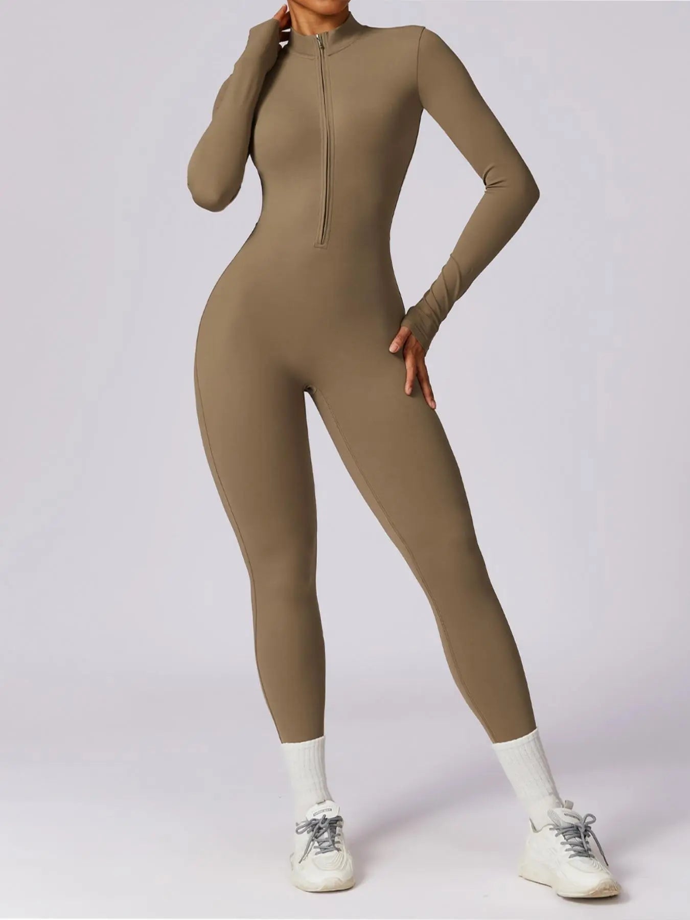 Elevate Your Workout Game with Our Comfy Zip-Up Sports Jumpsuit for Every Season! 🧘‍♀️💪 #Activewear #FitnessFashion