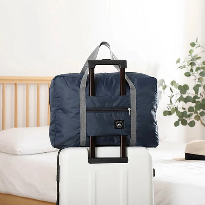 Capilorix foldable travel duffel bag for women, lightweight and large capacity carry-on bag suitable for weekend trips and sports.