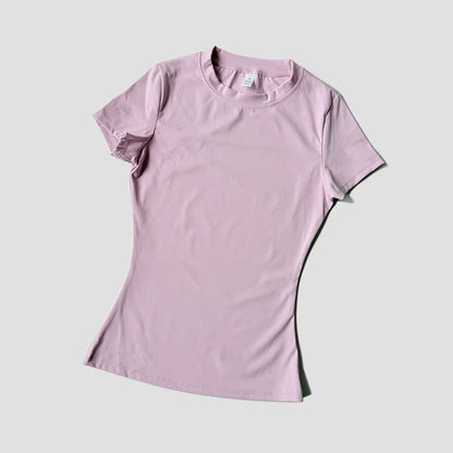 Capilorix women's seamless gym crop top, short sleeve yoga and running sports T-shirt for fitness and workout activewear.