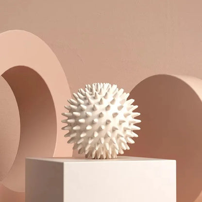 Capilorix hedgehog massage ball for yoga, fascia, muscle relaxation, and fitness, ideal for shoulder, neck, leg, and plantar massage.
