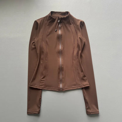 Capilorix women's quick-drying sports coat with long sleeves, zipper, and fitted top, ideal for yoga and running activities.
