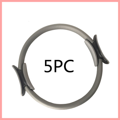 Capilorix yoga fitness Pilates ring for women and girls, activewear jumpsuit showing the circular resistance ring for workout and exercise.
