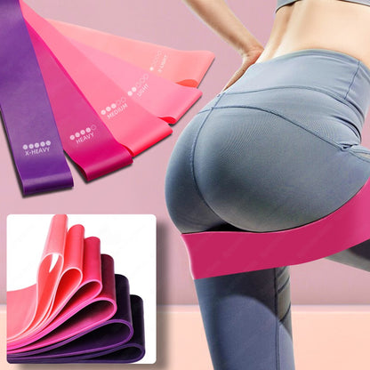 Capilorix resistance bands with sealing elastic design for fitness, yoga, and bodybuilding workouts, shown with gym bags and sports duffels.