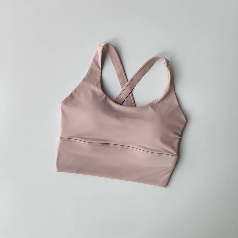 Capilorix all-in-one sports bra for high-impact running, yoga, and fitness, featuring shock-proof support and breathable summer fabric.