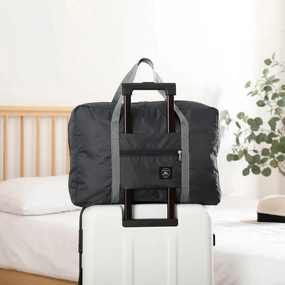 Capilorix foldable travel duffel bag for women, lightweight, large capacity carry-on bag for weekend trips and sports travel.