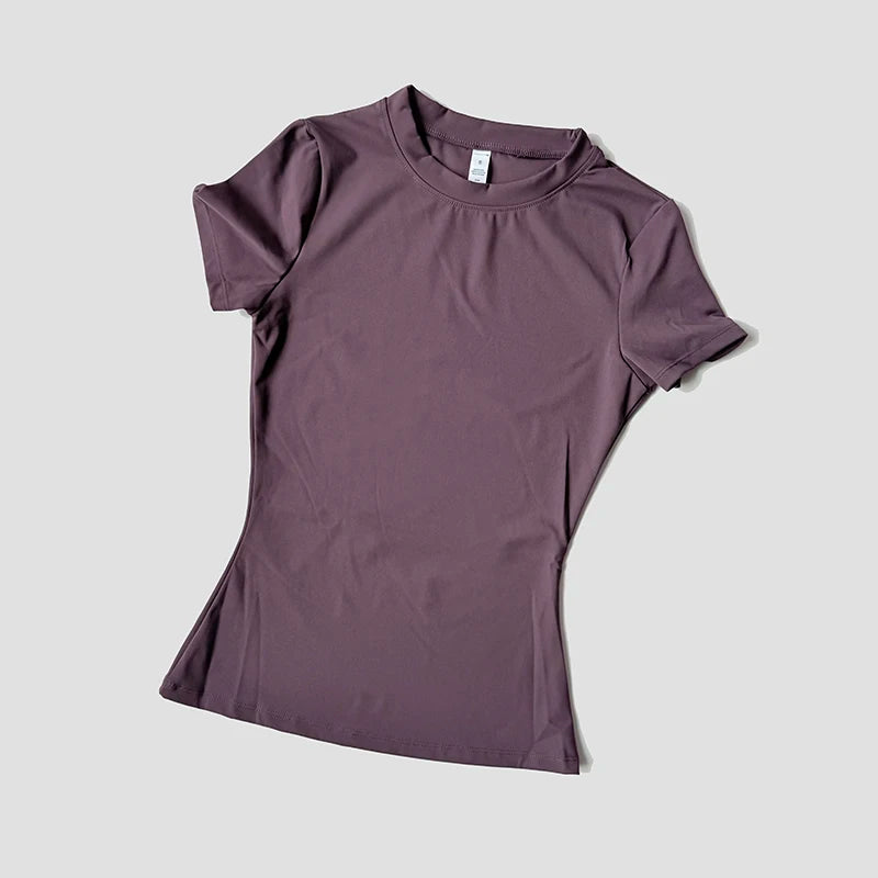 Capilorix women's seamless gym crop top, short sleeve yoga and workout tee, ideal for running and fitness activewear.