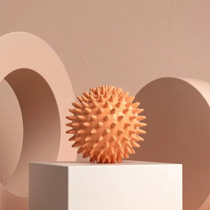 Capilorix hedgehog massage ball for yoga and muscle relaxation, used for fascia, shoulder, neck, and leg muscle relief.