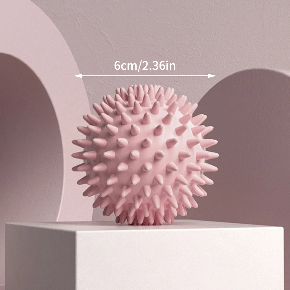 Capilorix hedgehog massage ball for yoga, fascia, and muscle relaxation, shown with textured surface for shoulder, neck, and leg massage.