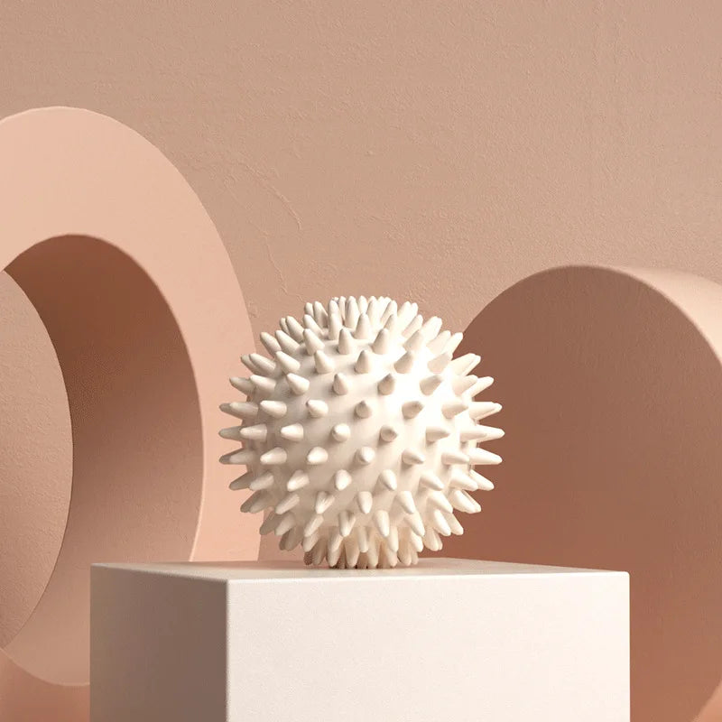 Capilorix hedgehog massage ball for yoga, muscle relaxation, and fascia therapy, designed for shoulder, neck, leg, and plantar massage.