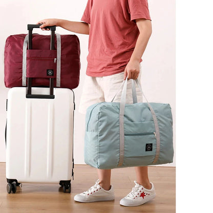 Capilorix foldable travel duffel bag for women, lightweight, large capacity carry-on for weekend trips and overnight travel.