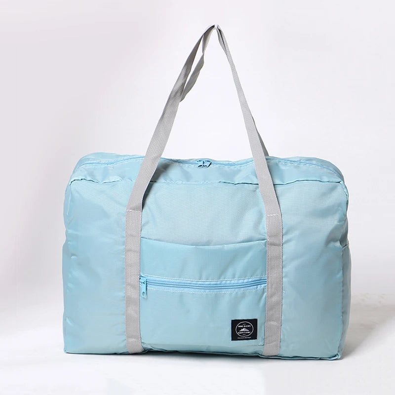 Capilorix portable travel luggage bag with large capacity, lightweight sports and fitness bag, foldable handheld boarding bag.