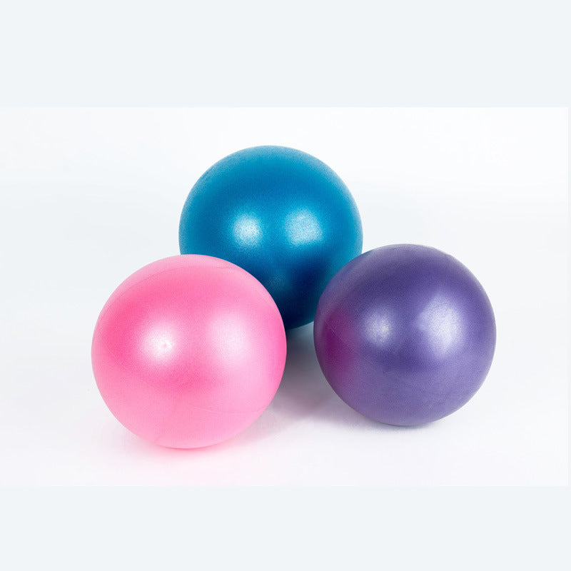 Capilorix Dance Fitness Massage Wheat Tube Yoga Ball in an activewear jumpsuit, designed for flexibility and relaxation during workouts.